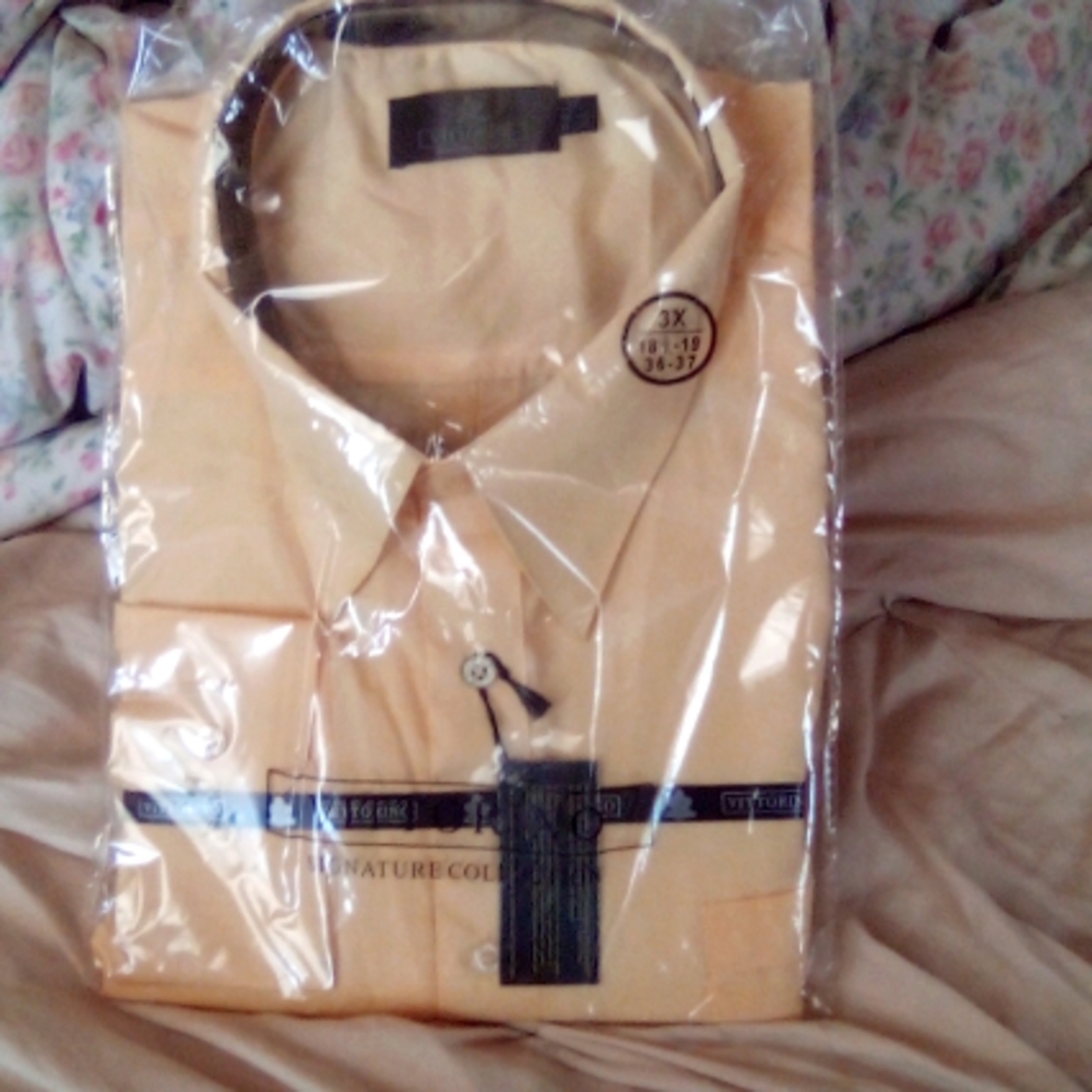A man's dress shirt 3x 18 to 19 is the size